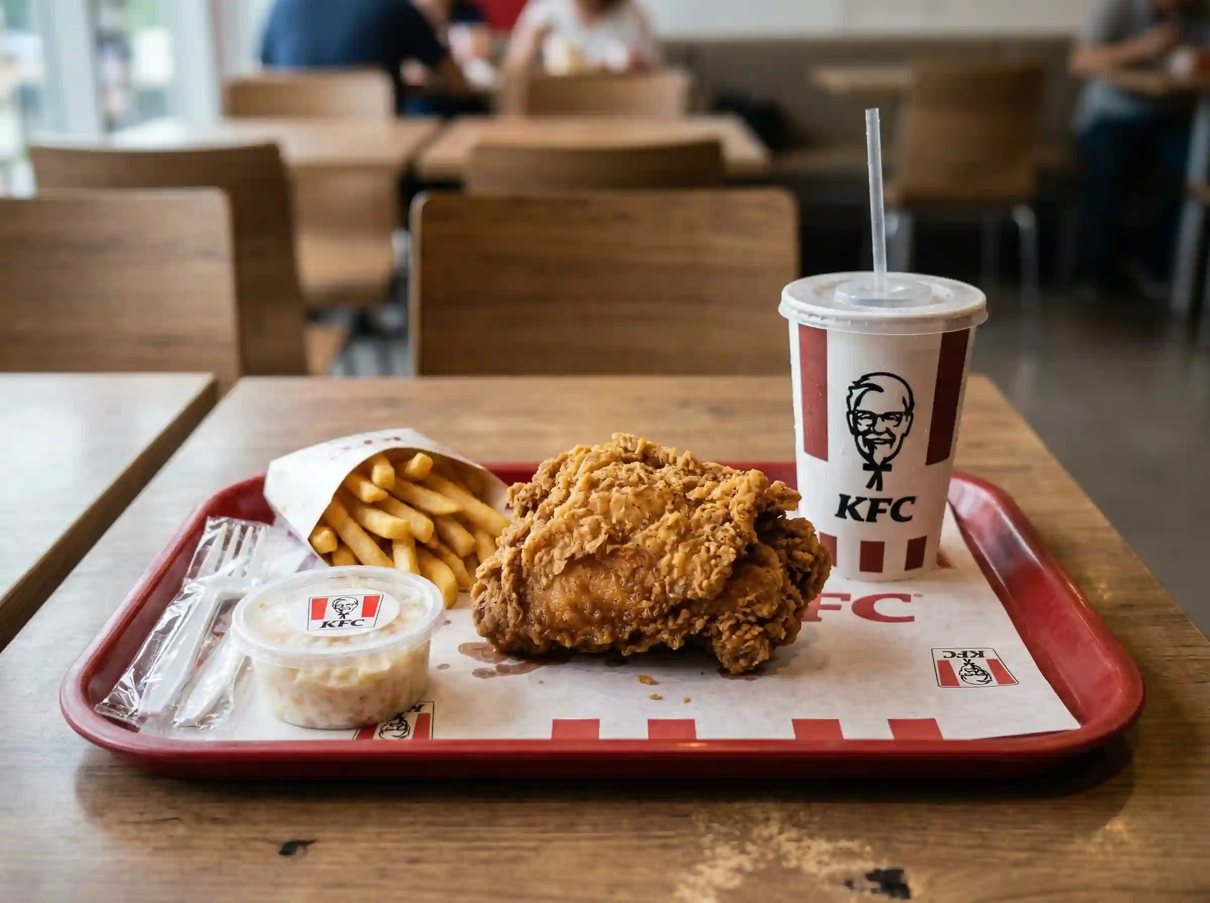 KFC chicken thigh combo meal with drink and side